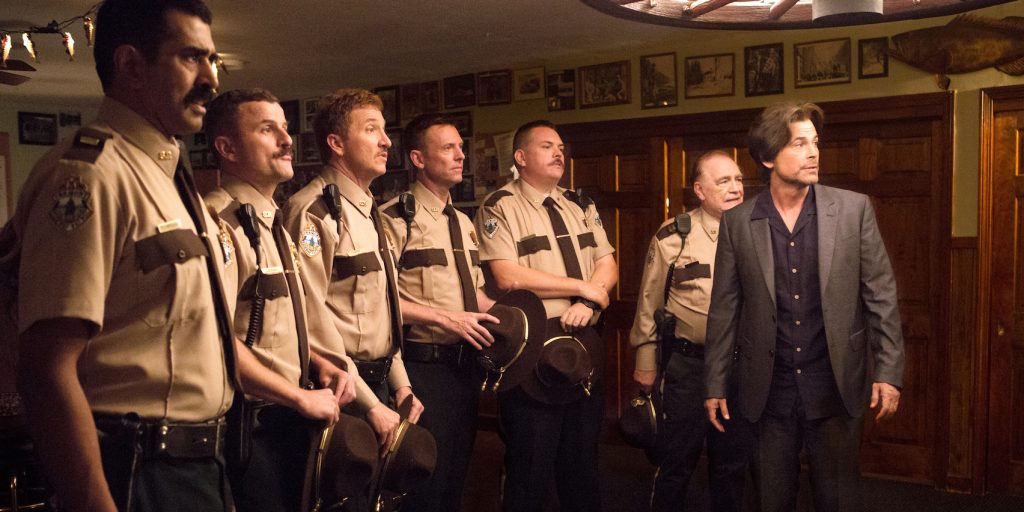 (From L-R): Jay Chandrasekhar as "Thorny," Steve Lemme as "Mac," Paul Soter as "Foster," Erik Stolhanske as "Rabbit," Kevin Heffernan as "Farva," Brian Cox as "Captain O'Hagan" and Rob Lowe as "Guy LeFranc" in the film SUPER TROOPERS 2. Photo by Jon Pack. © 2018 Twentieth Century Fox Film Corporation All Rights Reserved