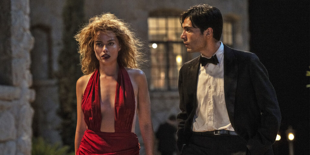 Margot Robbie plays Nellie LaRoy and Diego Calva plays Manny Torres in Babylon from Paramount Pictures.
