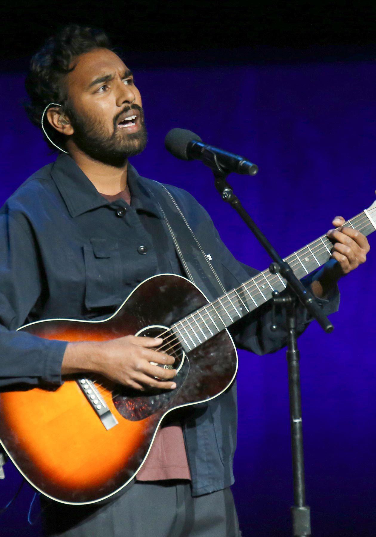 LAS VEGAS, NEVADA - APRIL 03:  Actor Himesh Patel performs during Universal Pictures special presentation during CinemaCon at The Colosseum at Caesars Palace on April 03, 2019 in Las Vegas, Nevada. CinemaCon is the official convention of the National Association of Theatre Owners. (Photo by Gabe Ginsberg/WireImage)