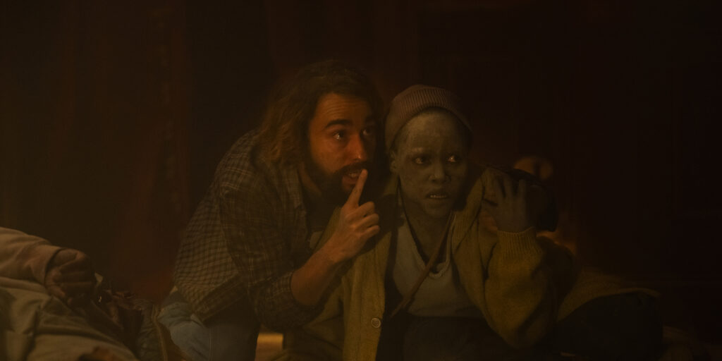 Alex Wolff as “Reuben” and Lupita Nyong’o as “Samira” in A Quiet Place: Day One from Paramount Pictures.